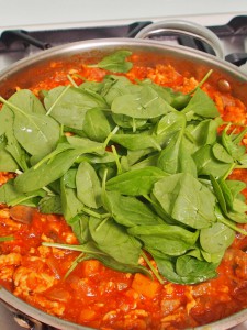 add spinach and basil to bolognese sauce